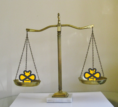 Brass scales with bees -- the Beeminder founders might have a bit of a fairness obsession brass scales with bees